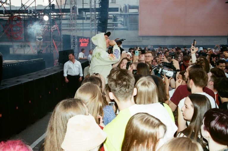 Live rap performance in Moscow with crowd engagement and vibrant atmosphere.